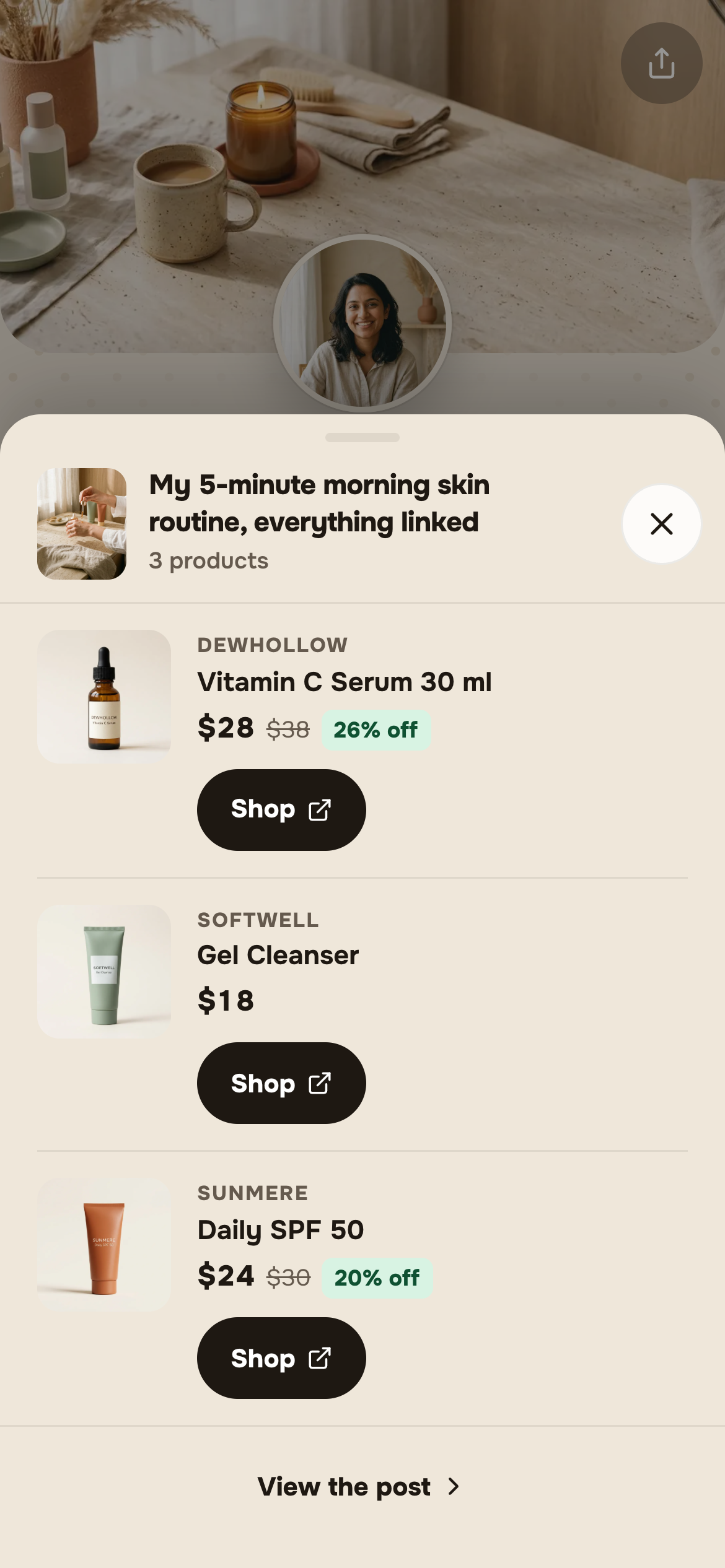 A product sheet slid up over a store page, listing three products, the first with its price, its struck-through original price and a discount badge.