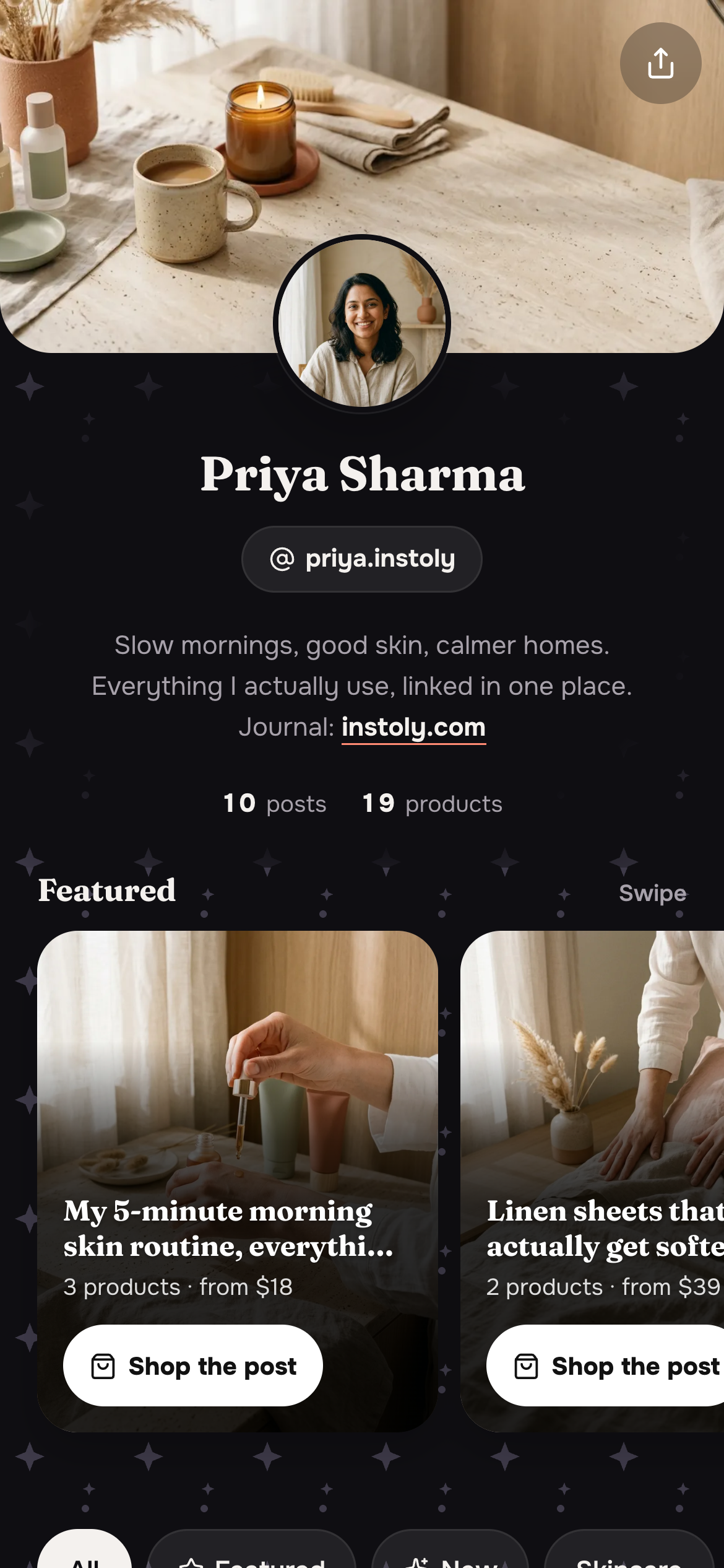 The same store page in a dark theme with a starred background pattern, instead of the sand-coloured one above.